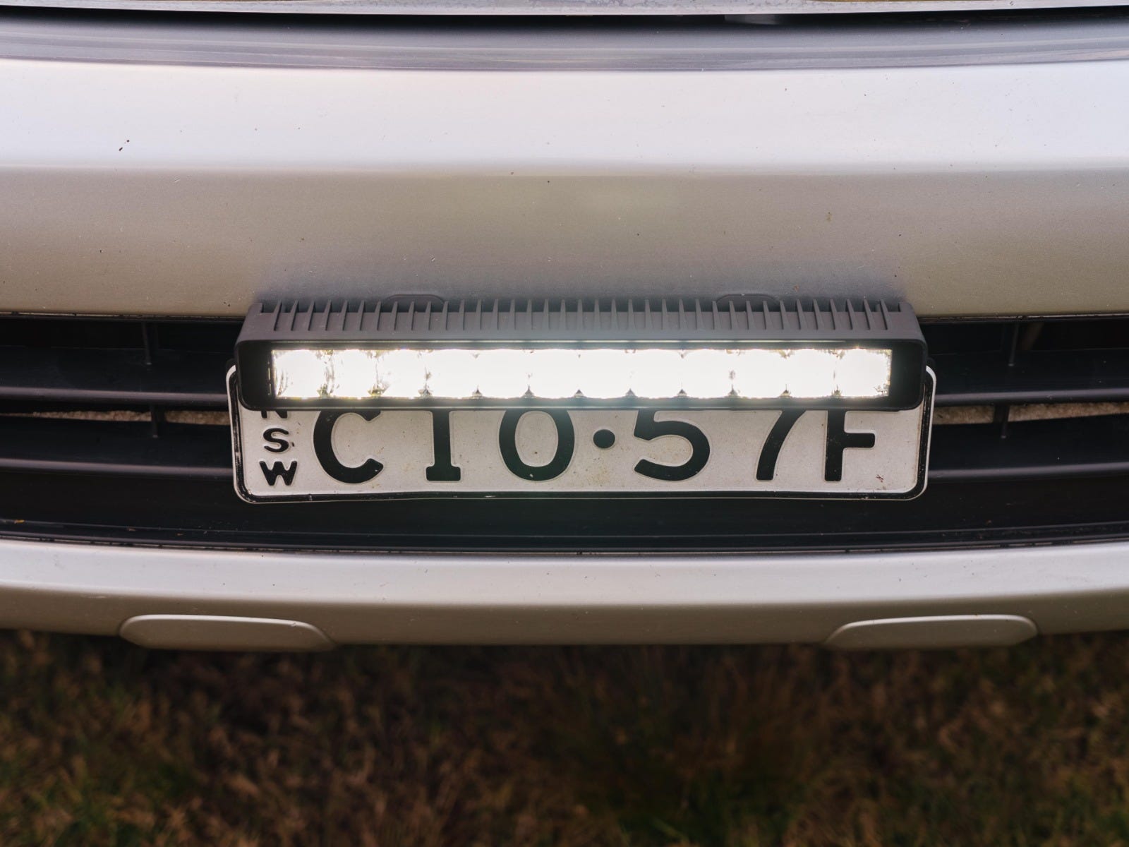 Car number plate with light top